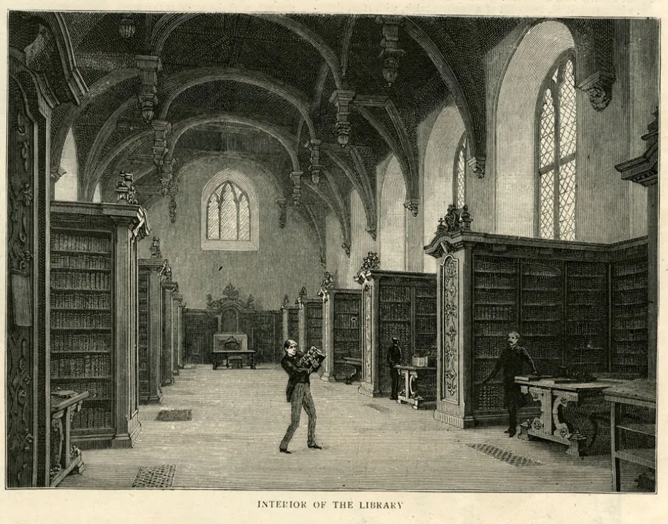 A Victorian librarian grappling with books in the Great Hall
