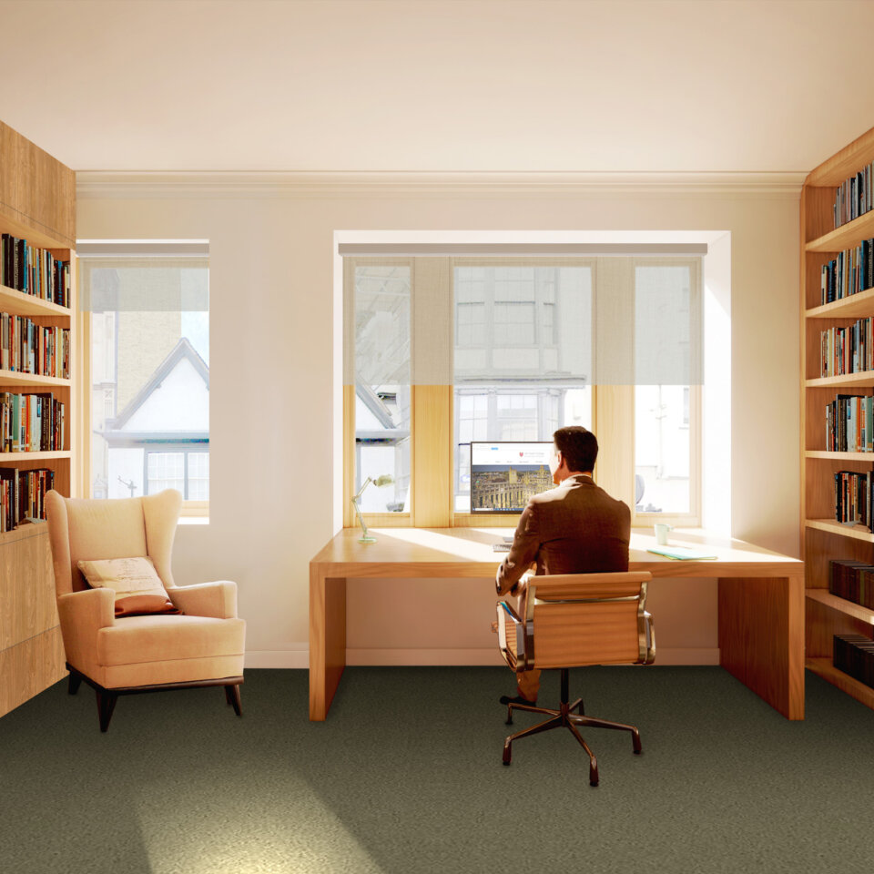 A moody rendering of the interior of a study room at All Souls College