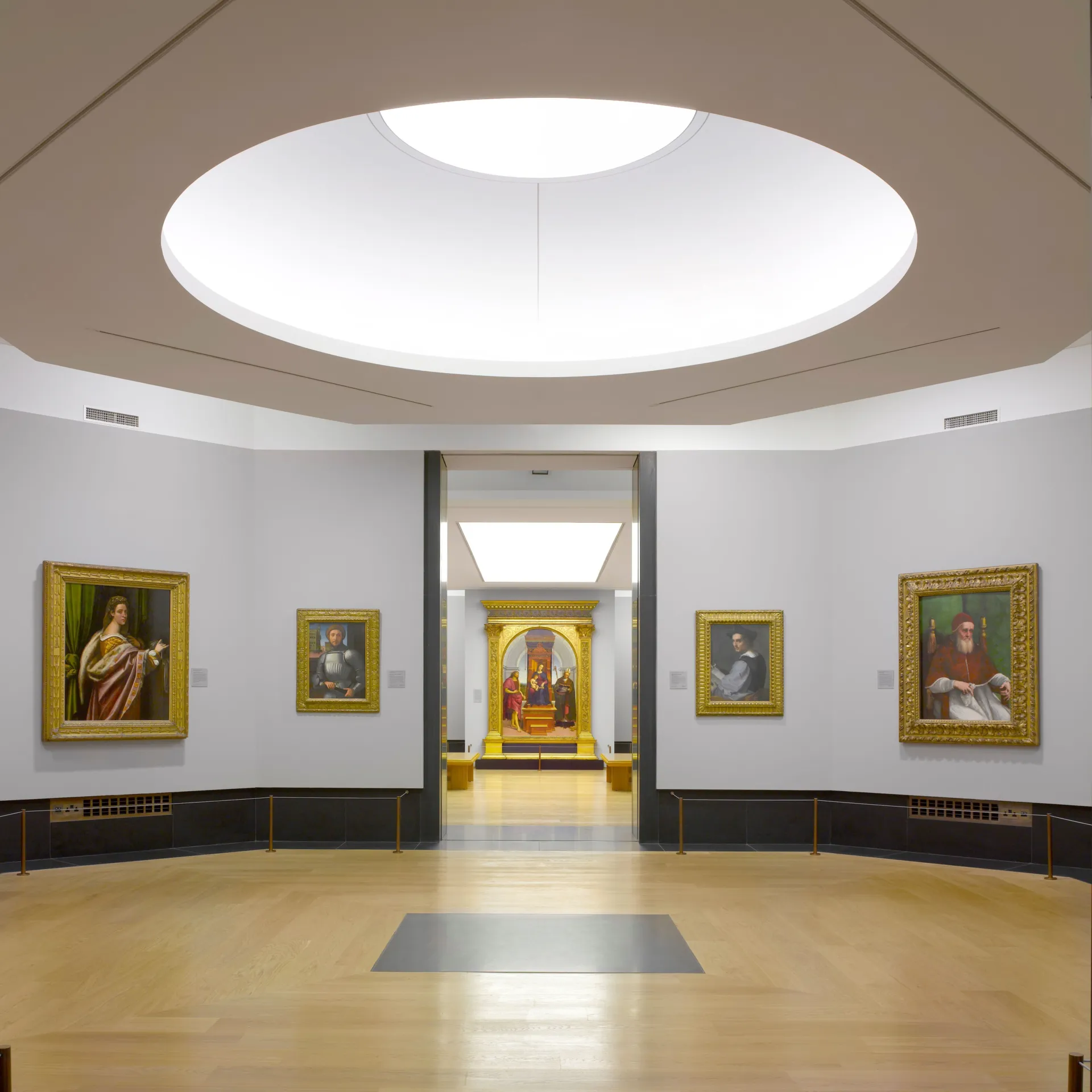 Sky lit museum galleries on the lower level of the National Gallery in London designed by Wright & Wright Architects